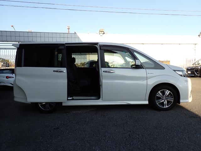 ステップワゴンスパーダ スパーダハイブリッド　Ｇ・ＥＸ　ホンダセンシング　純正９インチメモリーナビＴＶ　フリップダウンモニター　両側自動ドア　Ｂｌｕｅｔｏｏｔｈ　Ｂカメラ　ＥＴＣ　スマートキー　クルコン　ホンダセンシング　ＬＥＤライト　純正アルミ　７人乗り（6枚目）