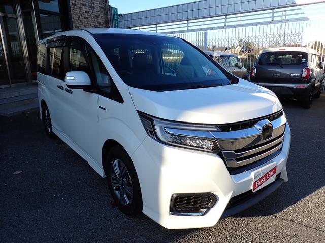 ステップワゴンスパーダ スパーダハイブリッド　Ｇ・ＥＸ　ホンダセンシング　純正９インチメモリーナビＴＶ　フリップダウンモニター　両側自動ドア　Ｂｌｕｅｔｏｏｔｈ　Ｂカメラ　ＥＴＣ　スマートキー　クルコン　ホンダセンシング　ＬＥＤライト　純正アルミ　７人乗り（7枚目）