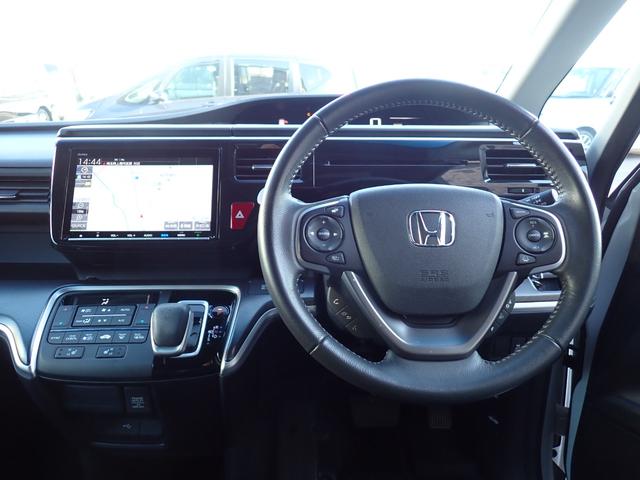 ステップワゴンスパーダ スパーダハイブリッド　Ｇ・ＥＸ　ホンダセンシング　純正９インチメモリーナビＴＶ　フリップダウンモニター　両側自動ドア　Ｂｌｕｅｔｏｏｔｈ　Ｂカメラ　ＥＴＣ　スマートキー　クルコン　ホンダセンシング　ＬＥＤライト　純正アルミ　７人乗り（18枚目）