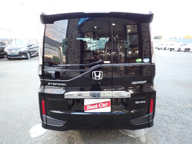 ステップワゴンスパーダ ｅ：ＨＥＶスパーダ　Ｇ　ホンダセンシング　後期型　純正１０インチメモリーナビ　フリップダウンモニター　両側自動ドア　ホンダセンシング　フルセグＴＶ　Ｂｌｕｅｔｏｏｔｈ　Ｂカメラ　ＥＴＣ　スマートキー　ＬＥＤライト　７人乗り（4枚目）