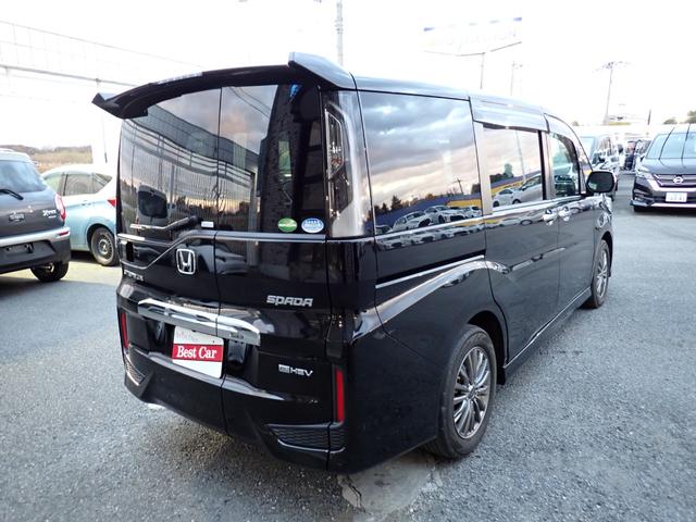 ステップワゴンスパーダ ｅ：ＨＥＶスパーダ　Ｇ　ホンダセンシング　後期型　純正１０インチメモリーナビ　フリップダウンモニター　両側自動ドア　ホンダセンシング　フルセグＴＶ　Ｂｌｕｅｔｏｏｔｈ　Ｂカメラ　ＥＴＣ　スマートキー　ＬＥＤライト　７人乗り（5枚目）