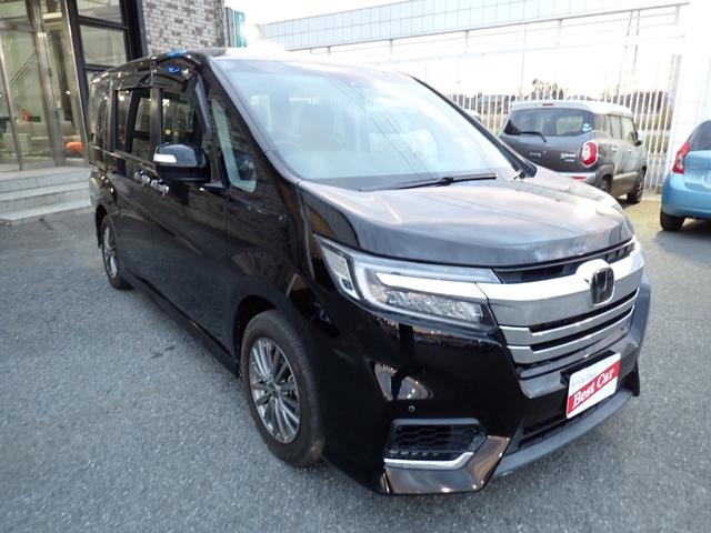 ステップワゴンスパーダ ｅ：ＨＥＶスパーダ　Ｇ　ホンダセンシング　後期型　純正１０インチメモリーナビ　フリップダウンモニター　両側自動ドア　ホンダセンシング　フルセグＴＶ　Ｂｌｕｅｔｏｏｔｈ　Ｂカメラ　ＥＴＣ　スマートキー　ＬＥＤライト　７人乗り（7枚目）