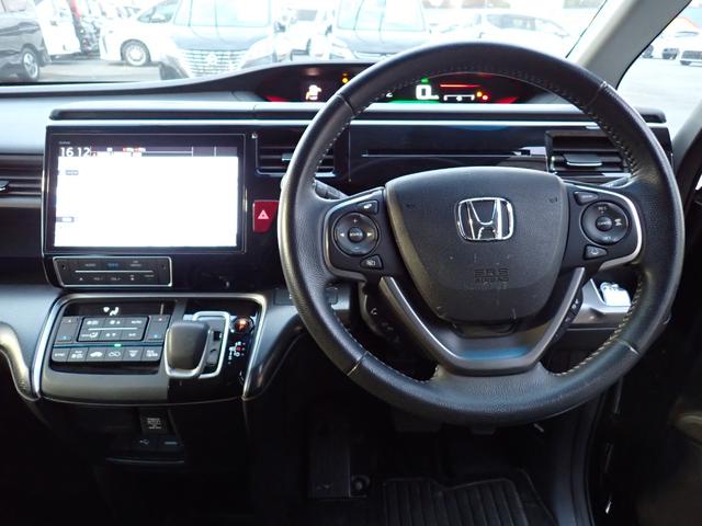 ステップワゴンスパーダ ｅ：ＨＥＶスパーダ　Ｇ　ホンダセンシング　後期型　純正１０インチメモリーナビ　フリップダウンモニター　両側自動ドア　ホンダセンシング　フルセグＴＶ　Ｂｌｕｅｔｏｏｔｈ　Ｂカメラ　ＥＴＣ　スマートキー　ＬＥＤライト　７人乗り（15枚目）