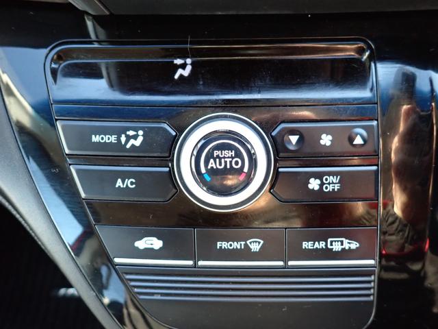 フリードハイブリッド ハイブリッド・Ｇホンダセンシング　モデューロエアロ　純正９インチナビ　フルセグＴＶ　Ｂｌｕｅｔｏｏｔｈ　ＥＴＣ　両側自動ドア　Ｓパッケージ　スマートキー　オートエアコン　クルコン　ホンダセンシング　ＬＥＤライト　純正アルミ　７人乗り（22枚目）