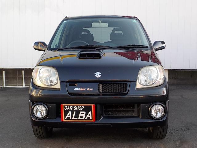 Keiワークス ベースグレード 5速マニュアル 4WD ターボ 社外HDDナビ シートヒーター 純正レカロシート 純正アルミ 純正エアロ ルーフスポイラー ワンセグTV 革巻きステア フォグライト ドアバイザー キーレス 電格ミラー(3枚目)