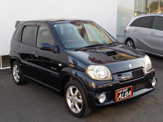 Keiワークス ベースグレード 5速マニュアル 4WD ターボ 社外HDDナビ シートヒーター 純正レカロシート 純正アルミ 純正エアロ ルーフスポイラー ワンセグTV 革巻きステア フォグライト ドアバイザー キーレス 電格ミラー(4枚目)