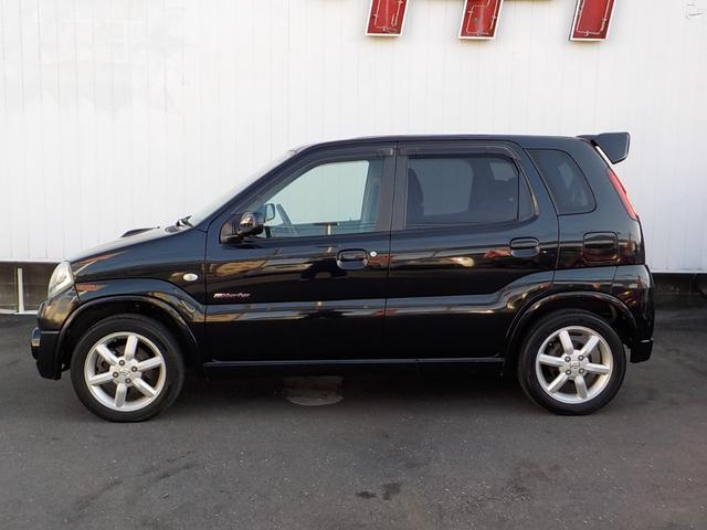 Keiワークス ベースグレード 5速マニュアル 4WD ターボ 社外HDDナビ シートヒーター 純正レカロシート 純正アルミ 純正エアロ ルーフスポイラー ワンセグTV 革巻きステア フォグライト ドアバイザー キーレス 電格ミラー(5枚目)