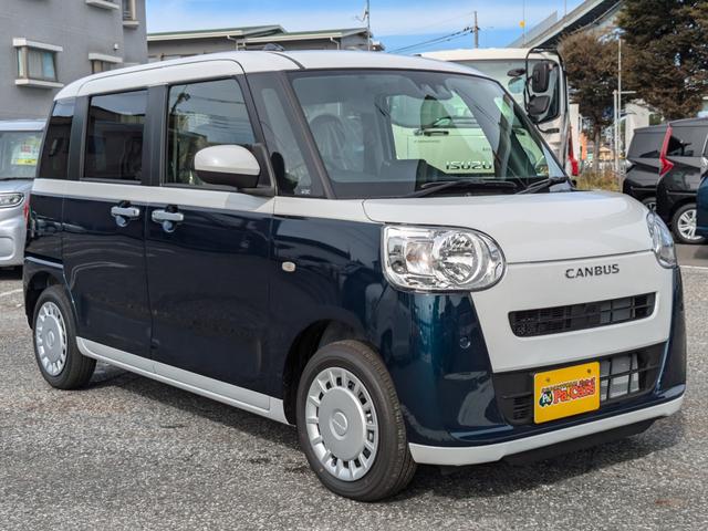 ムーヴキャンバス ストライプスX 両側電動スライドドア届出済未使用車 衝突被害軽減ブレーキオートライト スマートキー 障害物センサー Rカメラ 電動格納式ドアミラー 盗難防止装置 オートエアコン(7枚目)