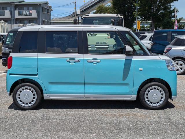 ムーヴキャンバス 届出済未使用車 オートライト バックカメラ USB ステアリングオーディオスイッチ リアパーキングセンサー オートエアコン プッシュスタート スマートキー 電動格納ミラー 左右電動スライドドア(9枚目)