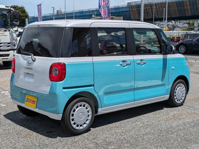 ムーヴキャンバス 届出済未使用車 オートライト バックカメラ USB ステアリングオーディオスイッチ リアパーキングセンサー オートエアコン プッシュスタート スマートキー 電動格納ミラー 左右電動スライドドア(10枚目)