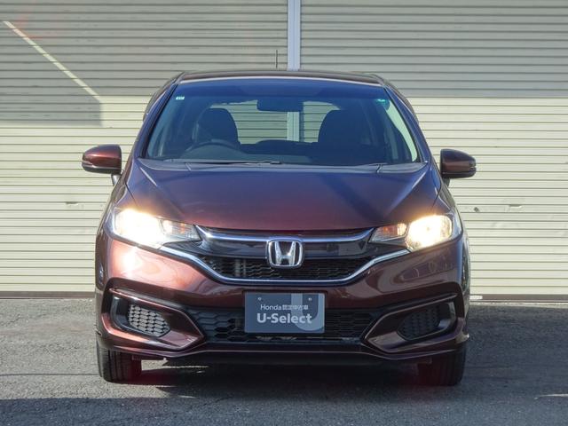 フィット １３Ｇ・Ｆ　禁煙　記録簿　イモビライザー　助手席エアバック　キーレス　ＡＡＣ　ワンオーナー　パワーウィンドー　スマートキ－　パワステ　運転席エアバッグ　横滑防止装置　ＡＢＳ　ｉ－ＳＴＯＰ（2枚目）