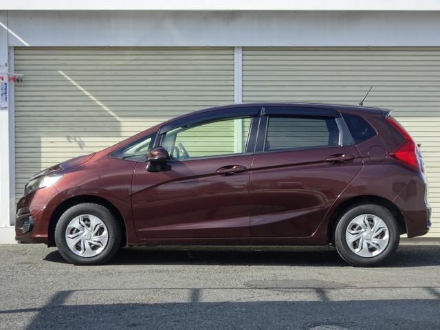 フィット １３Ｇ・Ｆ　禁煙　記録簿　イモビライザー　助手席エアバック　キーレス　ＡＡＣ　ワンオーナー　パワーウィンドー　スマートキ－　パワステ　運転席エアバッグ　横滑防止装置　ＡＢＳ　ｉ－ＳＴＯＰ（7枚目）