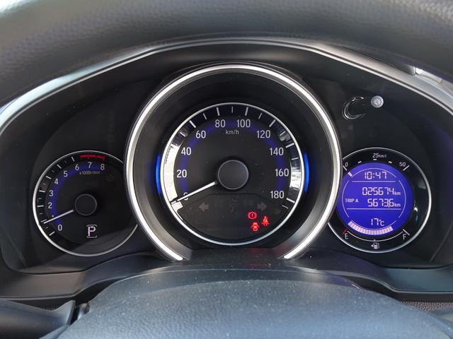 フィット １３Ｇ・Ｆ　禁煙　記録簿　イモビライザー　助手席エアバック　キーレス　ＡＡＣ　ワンオーナー　パワーウィンドー　スマートキ－　パワステ　運転席エアバッグ　横滑防止装置　ＡＢＳ　ｉ－ＳＴＯＰ（10枚目）