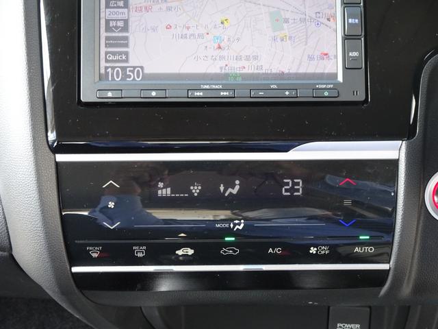 フィット １３Ｇ・Ｆ　禁煙　記録簿　イモビライザー　助手席エアバック　キーレス　ＡＡＣ　ワンオーナー　パワーウィンドー　スマートキ－　パワステ　運転席エアバッグ　横滑防止装置　ＡＢＳ　ｉ－ＳＴＯＰ（11枚目）