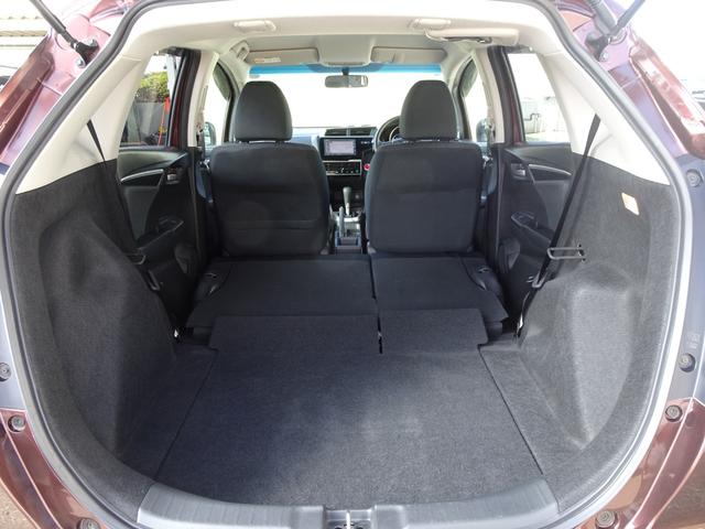 フィット １３Ｇ・Ｆ　禁煙　記録簿　イモビライザー　助手席エアバック　キーレス　ＡＡＣ　ワンオーナー　パワーウィンドー　スマートキ－　パワステ　運転席エアバッグ　横滑防止装置　ＡＢＳ　ｉ－ＳＴＯＰ（17枚目）