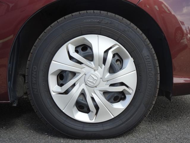 フィット １３Ｇ・Ｆ　禁煙　記録簿　イモビライザー　助手席エアバック　キーレス　ＡＡＣ　ワンオーナー　パワーウィンドー　スマートキ－　パワステ　運転席エアバッグ　横滑防止装置　ＡＢＳ　ｉ－ＳＴＯＰ（21枚目）