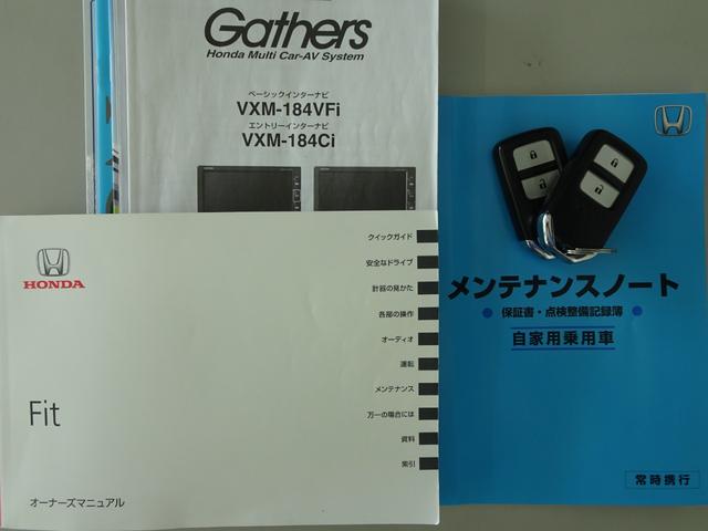 フィット １３Ｇ・Ｆ　禁煙　記録簿　イモビライザー　助手席エアバック　キーレス　ＡＡＣ　ワンオーナー　パワーウィンドー　スマートキ－　パワステ　運転席エアバッグ　横滑防止装置　ＡＢＳ　ｉ－ＳＴＯＰ（22枚目）
