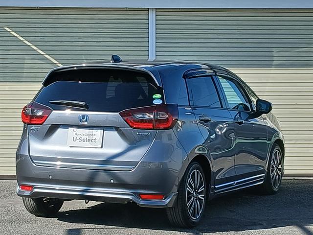 フィット ｅ：ＨＥＶリュクス　新品タイヤ４本交換付き　純正メモリーナビ＆前後ドラレコ　バックカメラ　障害物センサー　地デジチューナー　Ｂｌｕｅｔｏｏｔｈオーディオ　ＵＳＢ　前席シートヒーター　ＥＴＣ　禁煙車　ワンオーナー　ＬＥＤ（9枚目）