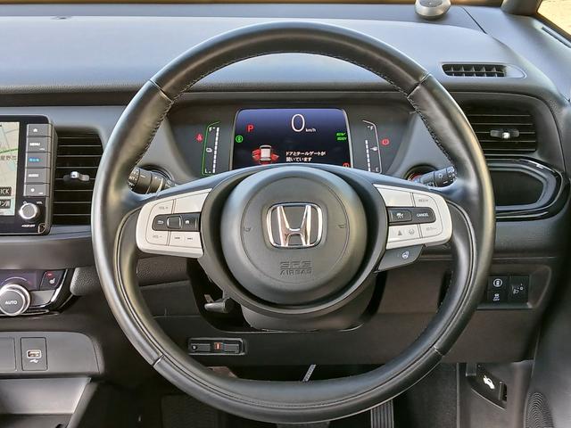 フィット ｅ：ＨＥＶリュクス　新品タイヤ４本交換付き　純正メモリーナビ＆前後ドラレコ　バックカメラ　障害物センサー　地デジチューナー　Ｂｌｕｅｔｏｏｔｈオーディオ　ＵＳＢ　前席シートヒーター　ＥＴＣ　禁煙車　ワンオーナー　ＬＥＤ（11枚目）