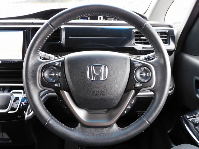 ステップワゴンスパーダ ｅ：ＨＥＶスパーダ　Ｇ・ＥＸ　ホンダセンシング　後期・９インチフルセグナビ・バックカメラ・ＢＴオーディオ・両側自動ドア・ＬＥＤライト・フォグＬＥＤ・ホンダセンシング・ＡＣＣ・ＥＴＣ・ハーフレザーシート・シートヒーター・フロアマット・ドアバイザー（10枚目）