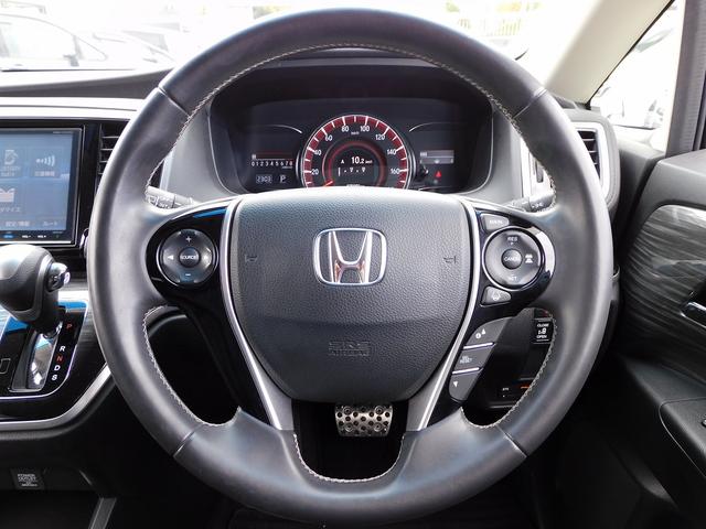 オデッセイ アブソルート・EXホンダセンシング 8インチフルセグナビ・バックカメラ・BTオーディオ・両側自動ドア・LEDライト・フォグライト・ホンダセンシング・ACC・BSM・ハーフレザーシート・本革ステアリング・ドアバイザー・フロアマット(10枚目)