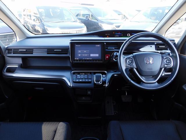 ステップワゴンスパーダ スパーダハイブリッド G ホンダセンシング 後期・9インチフルセグナビ・後席モニター・全周囲カメラ・BTオーディオ・両側自動ドア・LEDライト・フォグlED・16AW・ACC・ETC・本革ステアリング・アイドリングストップ・フロアマット(4枚目)