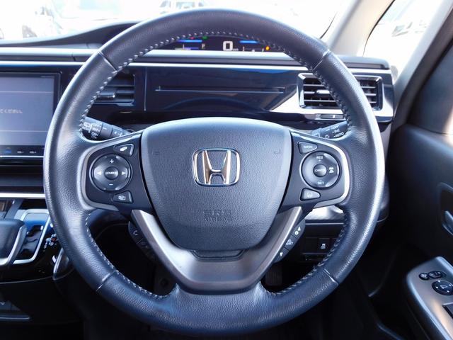 ステップワゴンスパーダ スパーダハイブリッド G ホンダセンシング 後期・9インチフルセグナビ・後席モニター・全周囲カメラ・BTオーディオ・両側自動ドア・LEDライト・フォグlED・16AW・ACC・ETC・本革ステアリング・アイドリングストップ・フロアマット(11枚目)