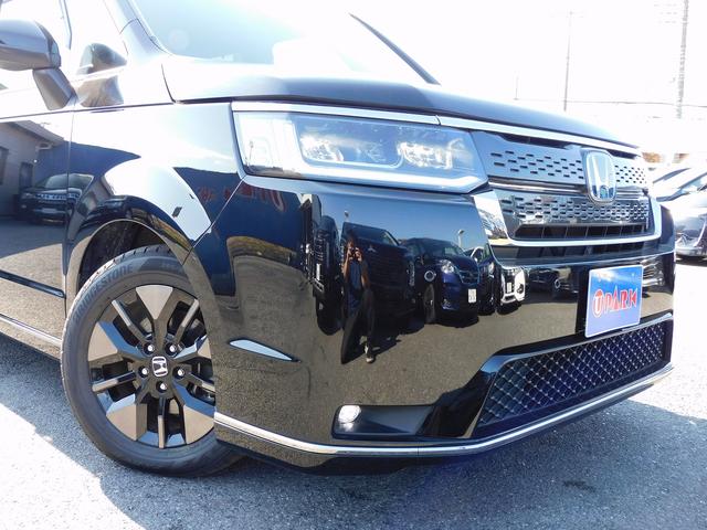 ステップワゴン ｅ：ＨＥＶスパーダ　８インチフルセグナビ・バックカメラ・ＢＴオーディオ・両側自動ドア・ＬＥＤライト・フォグＬＥＤ・１６ＡＷ・ホンダセンシング・ＡＣＣ・ＢＳＭ・ＥＴＣ・ハーフレザーシート・シートヒーター・フロアマット（16枚目）