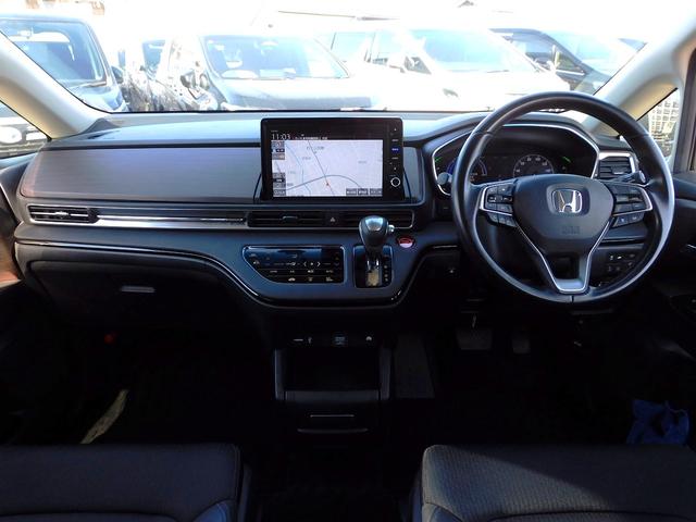 オデッセイハイブリッド ｅ：ＨＥＶアブソルート・ＥＸ　後期・１１インチフルセグナビ・全周囲カメラ・ＢＴオーディオ・両側自動ドア・ＬＥＤライト・フォグＬＥＤ・ホンダセンシング・ＡＣＣ・ＥＴＣ・ＢＳＭ・ハーフレザーシート・シートヒーター・アイドリングストップ（4枚目）