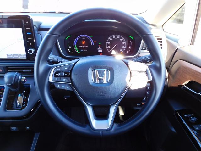 オデッセイハイブリッド ｅ：ＨＥＶアブソルート・ＥＸ　１０インチナビ地デジ・全カメラ・ＣＤ・ＤＶＤ・ブルートゥース・１８アルミ・レーダーＣ・ＬＫＡ・ＢＳＭ・両Ｐドア・Ｐゲート・ＬＥＤライト・ＵＳＢ・ＡＣ１００・Ｃソナー・パドルシフト・ＴＶキット・Ｐガラス（23枚目）