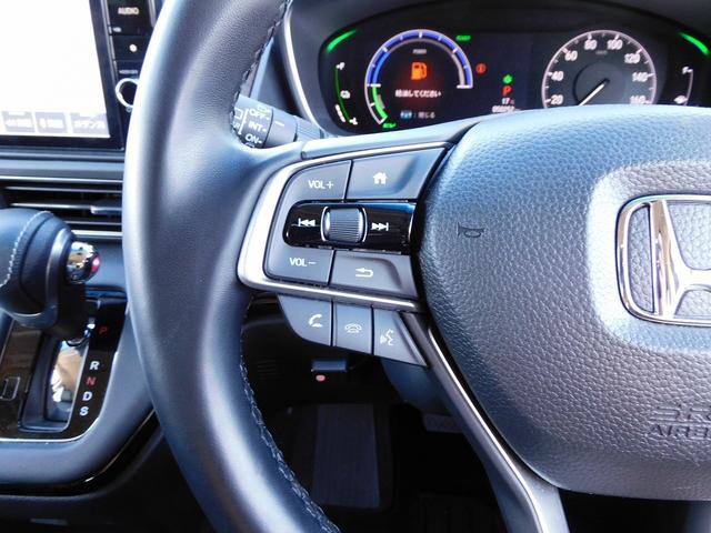 オデッセイハイブリッド ｅ：ＨＥＶアブソルート・ＥＸ　１０インチナビ地デジ・全カメラ・ＣＤ・ＤＶＤ・ブルートゥース・１８アルミ・レーダーＣ・ＬＫＡ・ＢＳＭ・両Ｐドア・Ｐゲート・ＬＥＤライト・ＵＳＢ・ＡＣ１００・Ｃソナー・パドルシフト・ＴＶキット・Ｐガラス（24枚目）