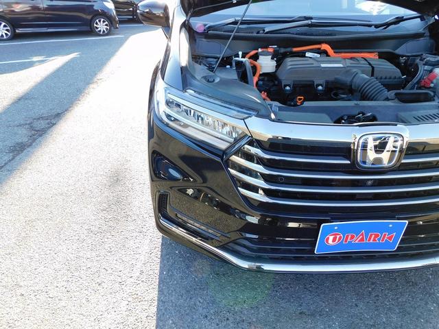 オデッセイハイブリッド ｅ：ＨＥＶアブソルート・ＥＸ　１０インチナビ地デジ・全カメラ・ＣＤ・ＤＶＤ・ブルートゥース・１８アルミ・レーダーＣ・ＬＫＡ・ＢＳＭ・両Ｐドア・Ｐゲート・ＬＥＤライト・ＵＳＢ・ＡＣ１００・Ｃソナー・パドルシフト・ＴＶキット・Ｐガラス（57枚目）