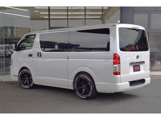 ハイエースバン スーパーＧＬ　ダークプライムＩＩ　ＥＴＣ　クリアランスソナー　レーンアシスト　衝突被害軽減システム　両側電動スライドドア　オートマチックハイビーム　スマートキー　電動格納ミラー　後席モニター　ＡＴ　アルミホイール　１００Ｖ電源　ＥＳＣ（6枚目）