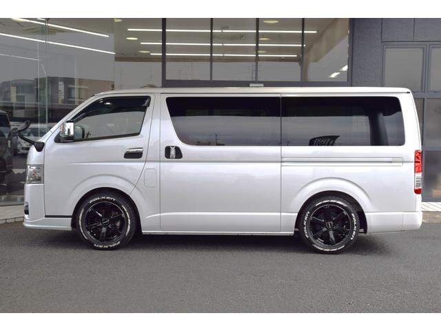 ハイエースバン スーパーＧＬ　ダークプライムＩＩ　ＥＴＣ　クリアランスソナー　レーンアシスト　衝突被害軽減システム　両側電動スライドドア　オートマチックハイビーム　スマートキー　電動格納ミラー　後席モニター　ＡＴ　アルミホイール　１００Ｖ電源　ＥＳＣ（7枚目）