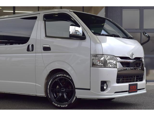 ハイエースバン スーパーＧＬ　ダークプライムＩＩ　ＥＴＣ　クリアランスソナー　レーンアシスト　衝突被害軽減システム　両側電動スライドドア　オートマチックハイビーム　スマートキー　電動格納ミラー　後席モニター　ＡＴ　アルミホイール　１００Ｖ電源　ＥＳＣ（8枚目）