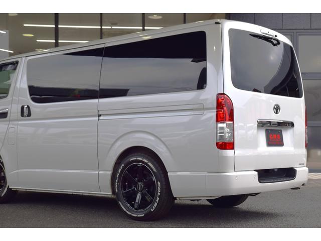 ハイエースバン スーパーＧＬ　ダークプライムＩＩ　ＥＴＣ　クリアランスソナー　レーンアシスト　衝突被害軽減システム　両側電動スライドドア　オートマチックハイビーム　スマートキー　電動格納ミラー　後席モニター　ＡＴ　アルミホイール　１００Ｖ電源　ＥＳＣ（12枚目）