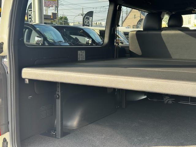 ハイエースバン スーパーＧＬ　ダークプライムＩＩ　ＥＴＣ　クリアランスソナー　レーンアシスト　衝突被害軽減システム　両側電動スライドドア　オートマチックハイビーム　スマートキー　電動格納ミラー　後席モニター　ＡＴ　アルミホイール　１００Ｖ電源　ＥＳＣ（19枚目）