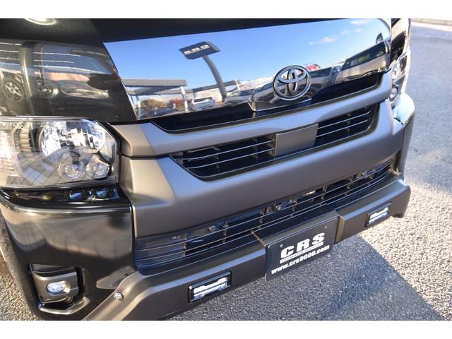 ハイエースワゴン GL 千葉BLACKSTYLE フロントバンパーガード ESSEX16インチアルミ 25mmオーバーフェンダー フローティングナビ 12.8型後席モニター 天井スピーカー デジタルインナーミラー(53枚目)