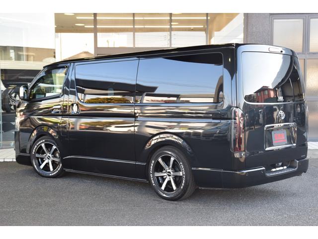 ハイエースバン スーパーGL ダークプライムII ローダウン ベッドキット 車中泊 フロントスポイラー ESSEX17インチアルミ フローティングナビ 10.1型後席モニター LEDヘッドライト LEDテールランプ バックカメラ付き防眩ミラー(6枚目)