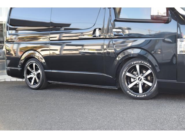 ハイエースバン スーパーGL ダークプライムII ローダウン ベッドキット 車中泊 フロントスポイラー ESSEX17インチアルミ フローティングナビ 10.1型後席モニター LEDヘッドライト LEDテールランプ バックカメラ付き防眩ミラー(10枚目)