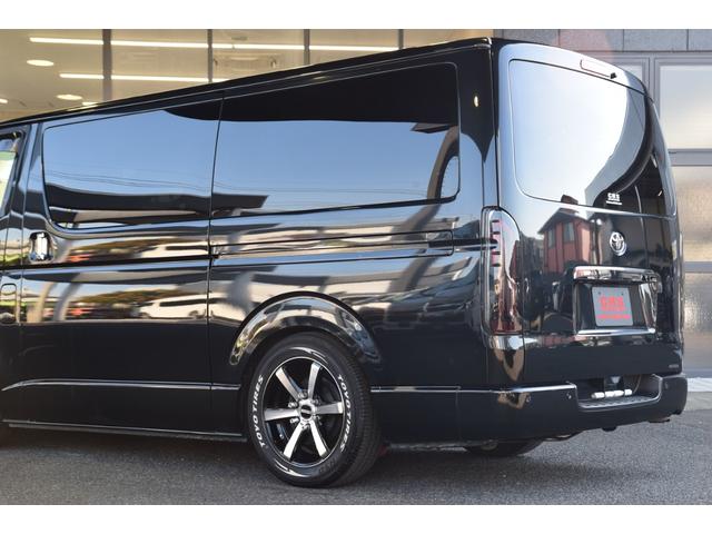 ハイエースバン スーパーGL ダークプライムII ローダウン ベッドキット 車中泊 フロントスポイラー ESSEX17インチアルミ フローティングナビ 10.1型後席モニター LEDヘッドライト LEDテールランプ バックカメラ付き防眩ミラー(12枚目)