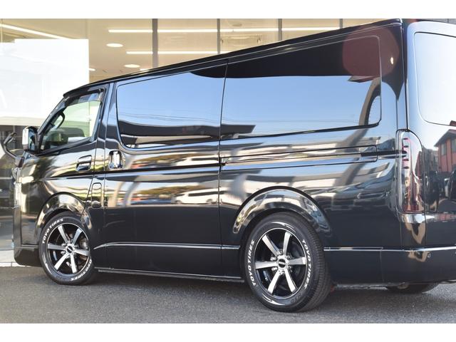 ハイエースバン スーパーGL ダークプライムII ローダウン ベッドキット 車中泊 フロントスポイラー ESSEX17インチアルミ フローティングナビ 10.1型後席モニター LEDヘッドライト LEDテールランプ バックカメラ付き防眩ミラー(13枚目)