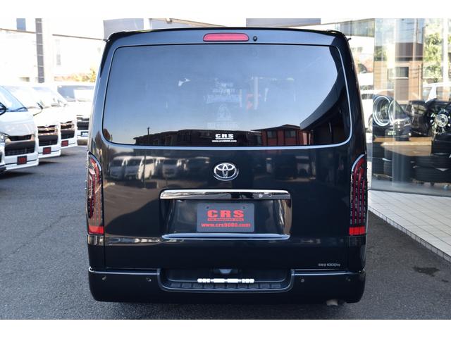 ハイエースバン スーパーGL ダークプライムII ローダウン ベッドキット 車中泊 フロントスポイラー ESSEX17インチアルミ フローティングナビ 10.1型後席モニター LEDヘッドライト LEDテールランプ バックカメラ付き防眩ミラー(17枚目)