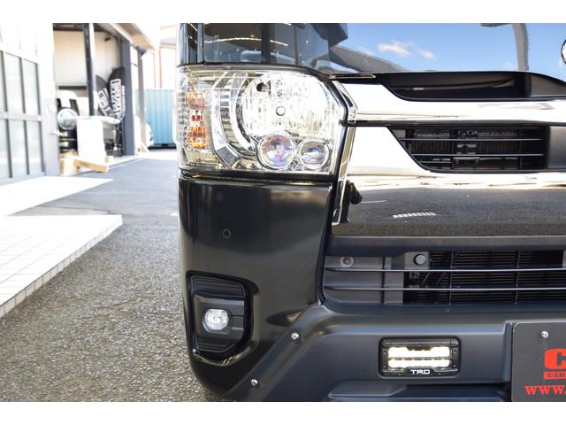 ハイエースバン スーパーGL ダークプライムII オフロードスタイル ETC 全周囲カメラ ナビ クリアランスソナー レーンアシスト 衝突被害軽減システム 両側スライドドア オートマチックハイビーム スマートキー 電動格納ミラー AT アルミホイール(50枚目)