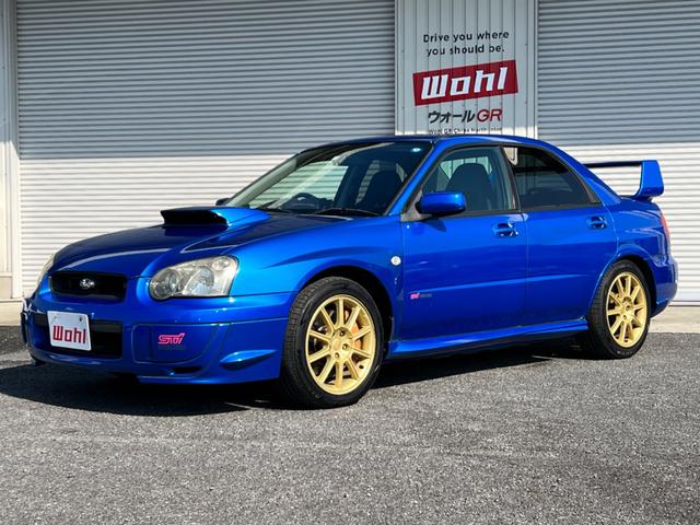 インプレッサ ＷＲＸ　ＳＴｉ　６速ＭＴ　４ＷＤ　ターボ　ＳＴＩ３連メーター　ＳＴＩブーストメーター　ブレンボキャリパー　ＳＴＩ純正シート　社外マフラー　大型リアスポイラー　純正１７インチアルミホイール　純正マフラーあり（20枚目）