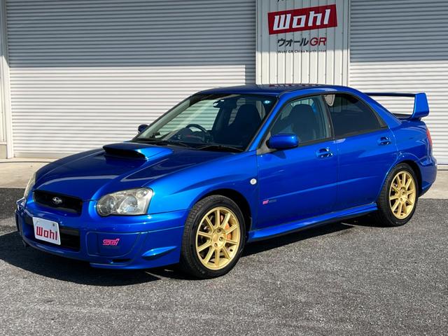 インプレッサ ＷＲＸ　ＳＴｉ　６速ＭＴ　４ＷＤ　ターボ　ＳＴＩ３連メーター　ＳＴＩブーストメーター　ブレンボキャリパー　ＳＴＩ純正シート　社外マフラー　大型リアスポイラー　純正１７インチアルミホイール　純正マフラーあり（31枚目）