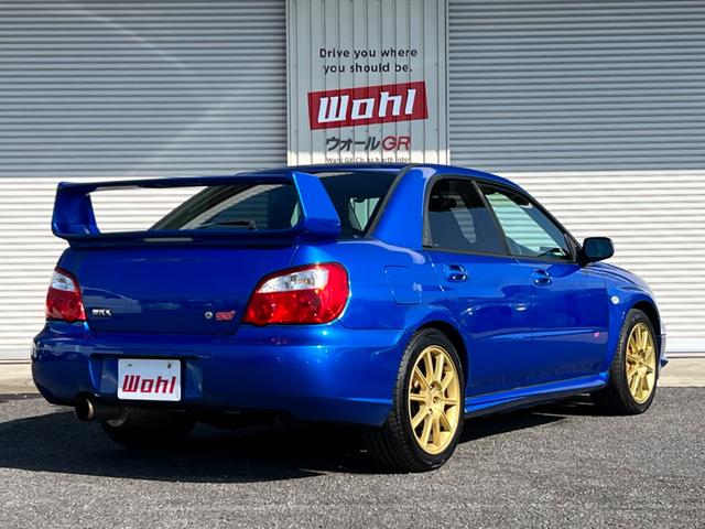 インプレッサ ＷＲＸ　ＳＴｉ　６速ＭＴ　４ＷＤ　ターボ　ＳＴＩ３連メーター　ＳＴＩブーストメーター　ブレンボキャリパー　ＳＴＩ純正シート　社外マフラー　大型リアスポイラー　純正１７インチアルミホイール　純正マフラーあり（60枚目）