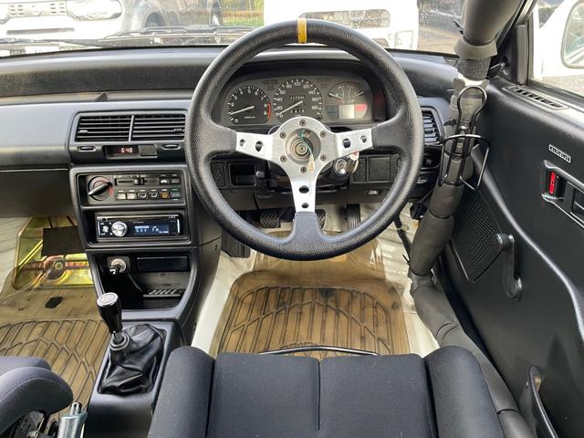 シビック ＳｉＲ　５速ＭＴ　Ｂ１６Ａエンジン　ＢＲＩＤＥフルバケットシート　１２点式ロールケージ　ゼロファイター車高調　５ＺＩＧＥＮエキマニ　バーディークラブＳＰＥＣ２マフラー　ＥＮＫＥＩ１５インチアルミホ―イル（28枚目）