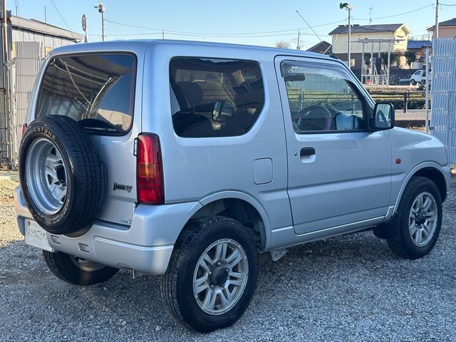 ジムニー XG 5MT パートタイム4WD インタークーラーターボ キーレス パワーウィンドウ KENWOODオーディオ 16インチアルミホイール タイミングチェーン 修復歴なし(5枚目)