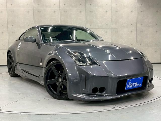 フェアレディZ バージョンT 社外エアロバンパー トランクスポイラー 社外ヘッドライト・20インチアルミ 黒革シート パワーシート 社外ナビ フルセグTV Bluetooth バックモニター 革巻きステア リモコンキー ETC(11枚目)